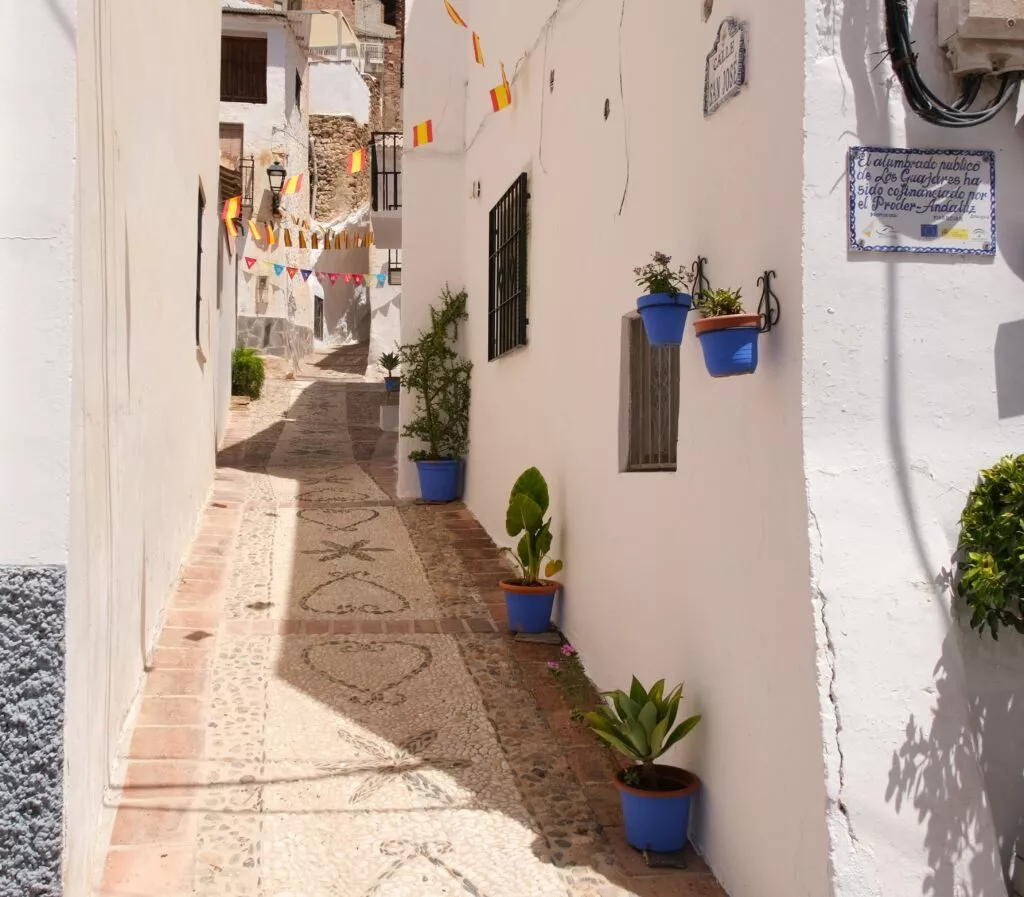 typical and authentic andalucia los guajares guajar faraguit narrow street with white houses